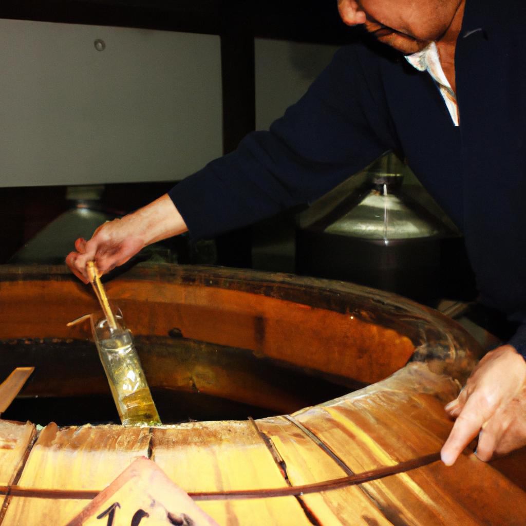 Person distilling shochu using traditional methods